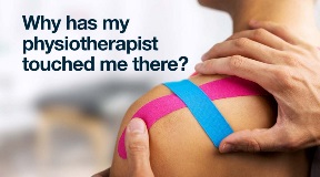 Physiotherapist taping a shoulder